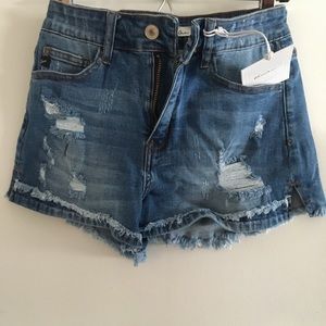 Distressed denim shorts size 26